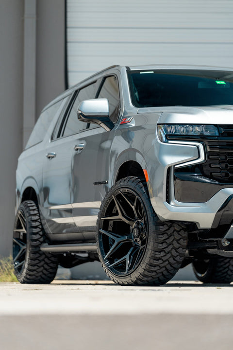 CHEVROLET SUBURBAN 4PLAY WHEELS 4P06 RIMS 24X12 33X12.5X24 RBP TIRES STOCK SUSPENSION