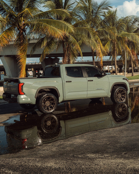 ’24 Toyota Tundra on our New 4P83 Bronze Finish with a 33x12.5x22 Toyo Tire on Stock Suspension
