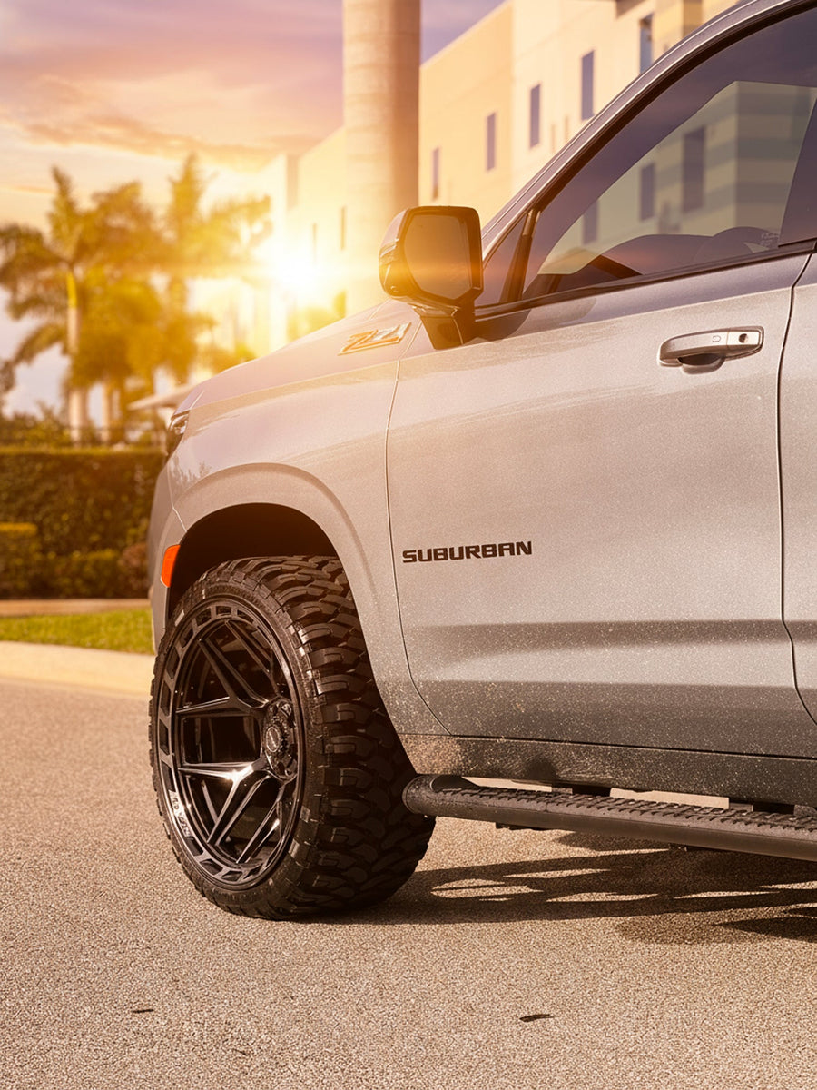 Chevrolet Suburban 4PLAY Wheels 4P55 24x12 33x12.5x24 RBP Tires Stock Suspension