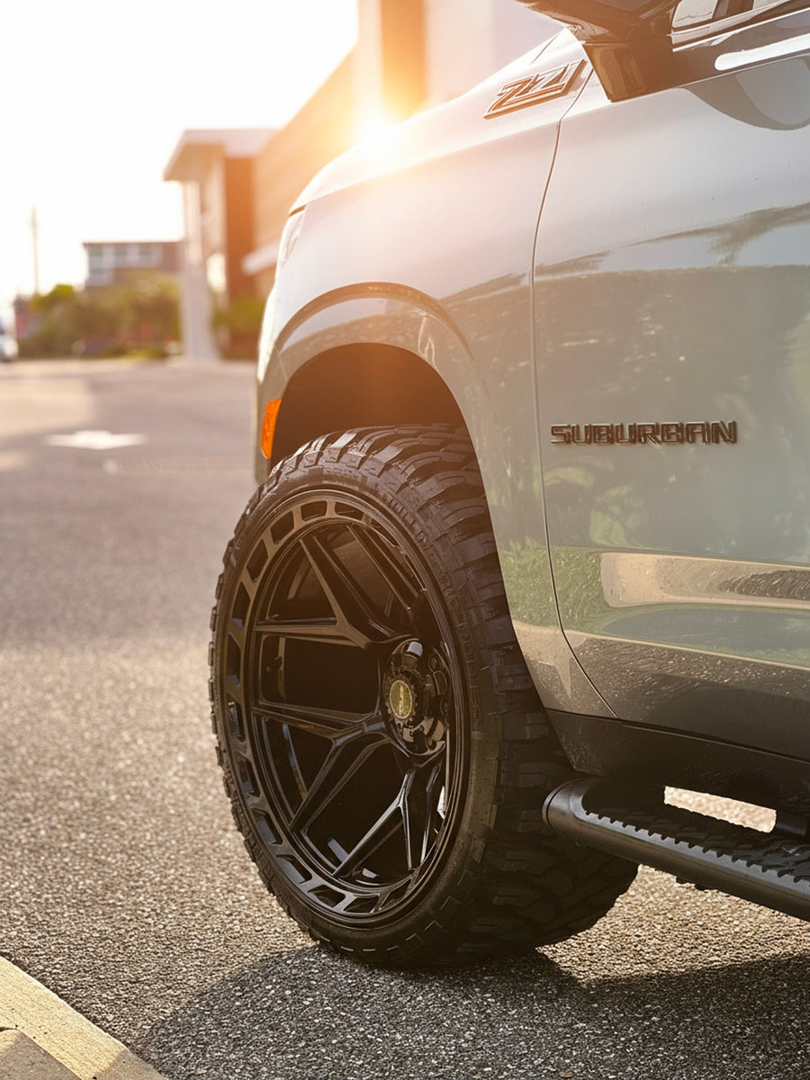 Chevrolet Suburban 4PLAY Wheels 4P55 24x12 33x12.5x24 RBP Tires Stock Suspension