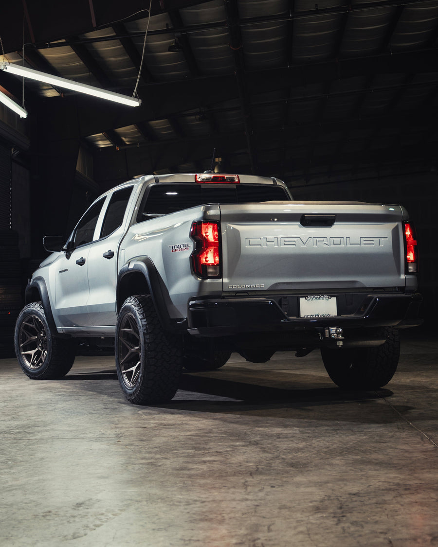 Chevrolet Colorado Trail Boss 4PLAY Wheels 4P06 Bronze 20x10 Rims 275x55x20 General Grabber Tires Stock Suspension