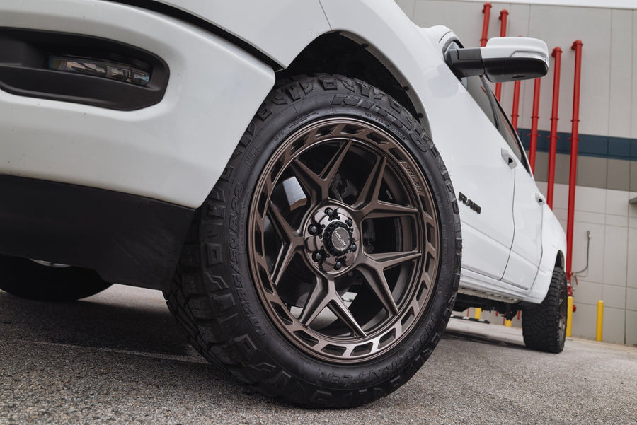 RAM 1500 4PLAY WHEELS 4P55 BRONZE 22X10 285X50X22 NITTO TIRES