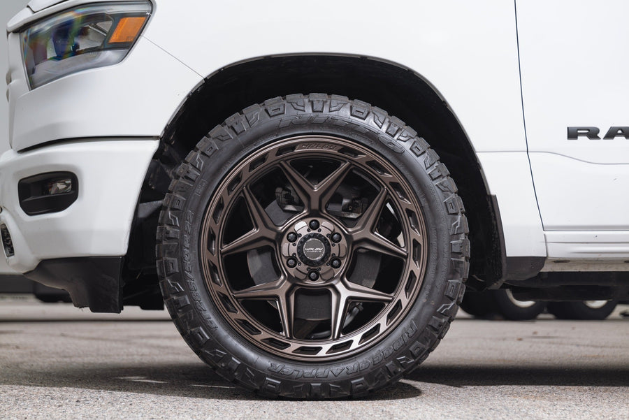 RAM 1500 4PLAY WHEELS 4P55 BRONZE 22X10 285X50X22 NITTO TIRES