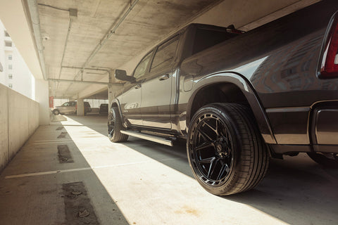 RAM 1500 4PLAY WHEELS 4P55 G3 24X12 ON 335X30X24 CONTINENTAL TIRES STOCK HEIGHT