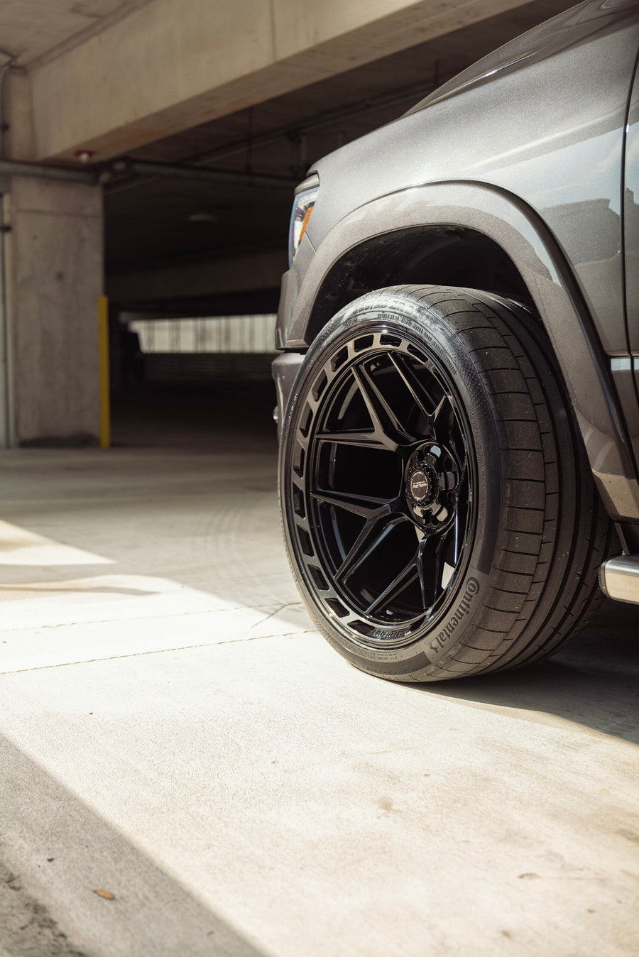RAM 1500 4PLAY WHEELS 4P55 G3 24X12 ON 335X30X24 CONTINENTAL TIRES STOCK HEIGHT