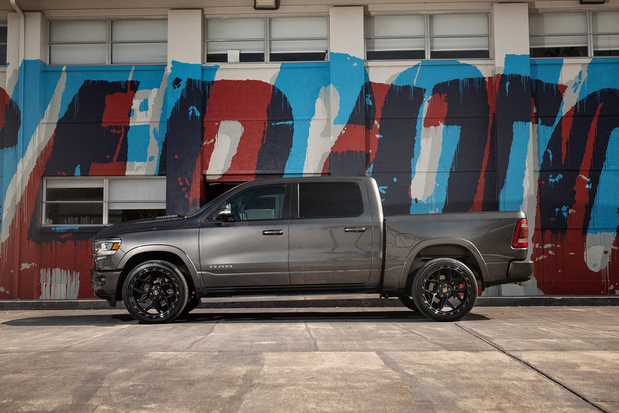 RAM 1500 4PLAY WHEELS 4P55 G3 24X12 ON 335X30X24 CONTINENTAL TIRES STOCK HEIGHT