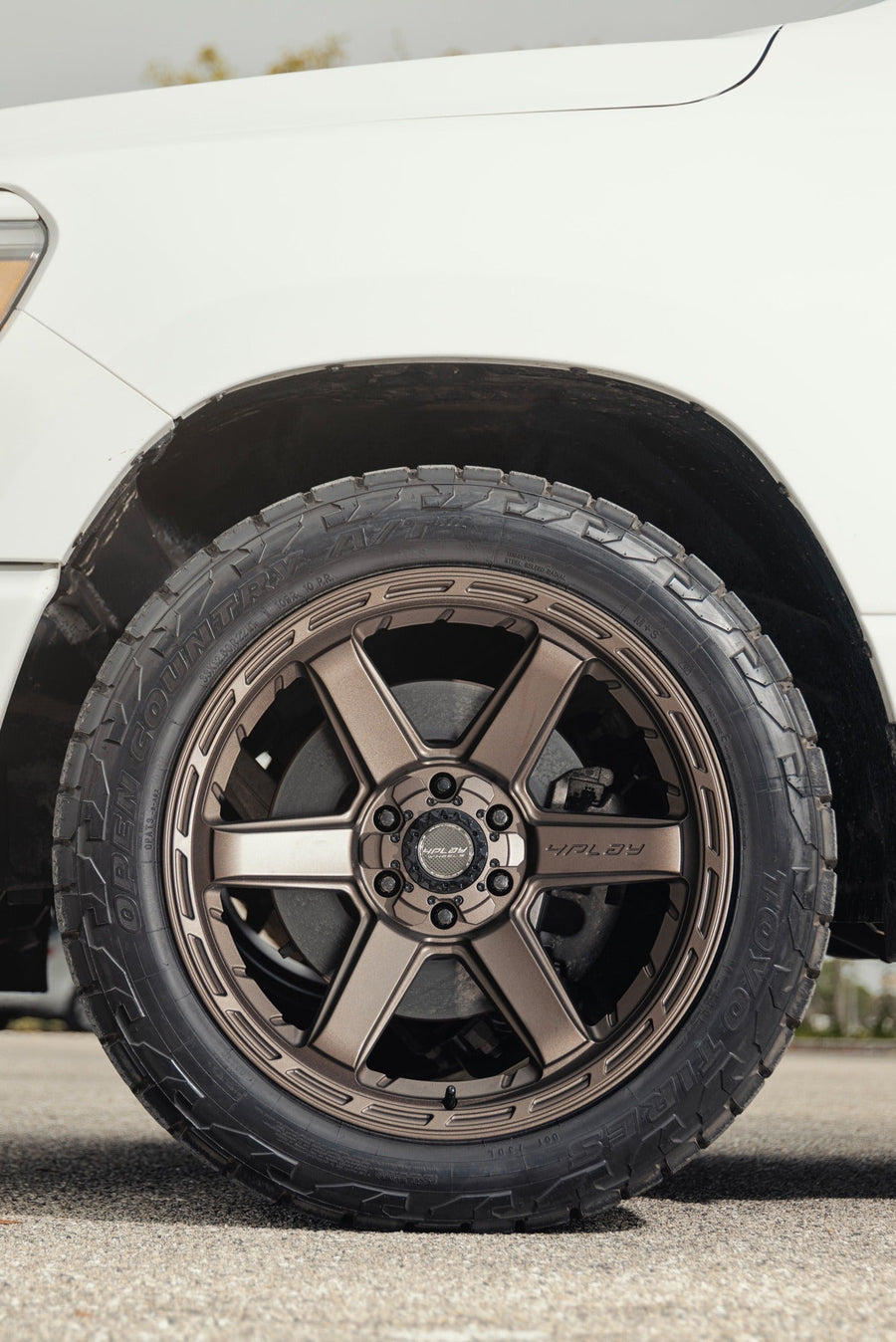 RAM 1500 4PLAY WHEELS 4P63 BRONZE 22X10 33X12.5X22 TOYO TIRES