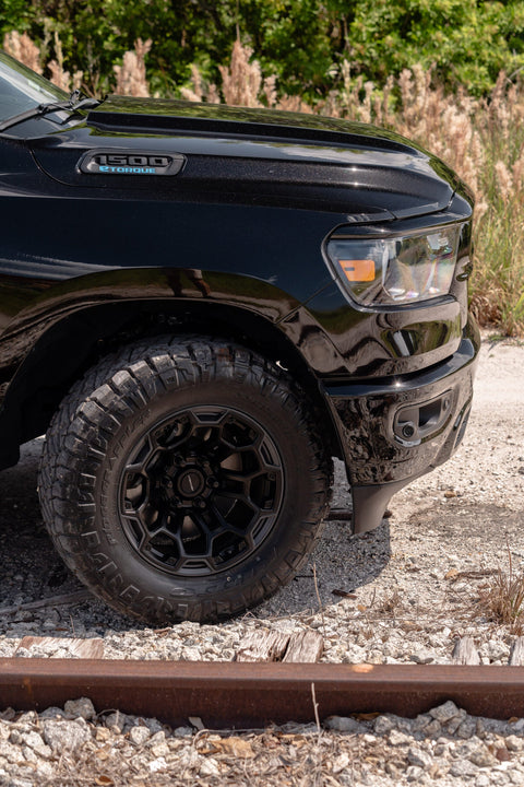 RAM 1500 DEFIANT WHEELS DF03 18X9 33X12.5X18 NITTO TIRES STOCK SUSPENSION