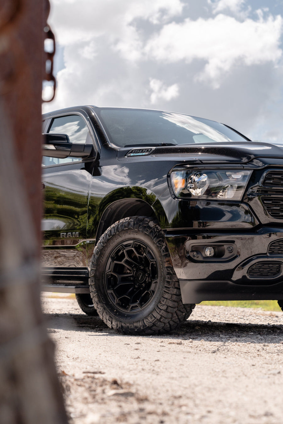 RAM 1500 DEFIANT WHEELS DF03 18X9 33X12.5X18 NITTO TIRES STOCK SUSPENSION