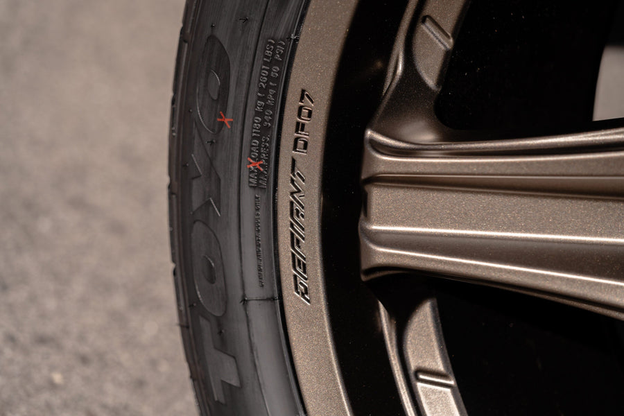 RAM 1500 DEFIANT WHEELS DF07 BRONZE 22X10 305X40X22 TOYO TIRES STOCK SUSPENSION