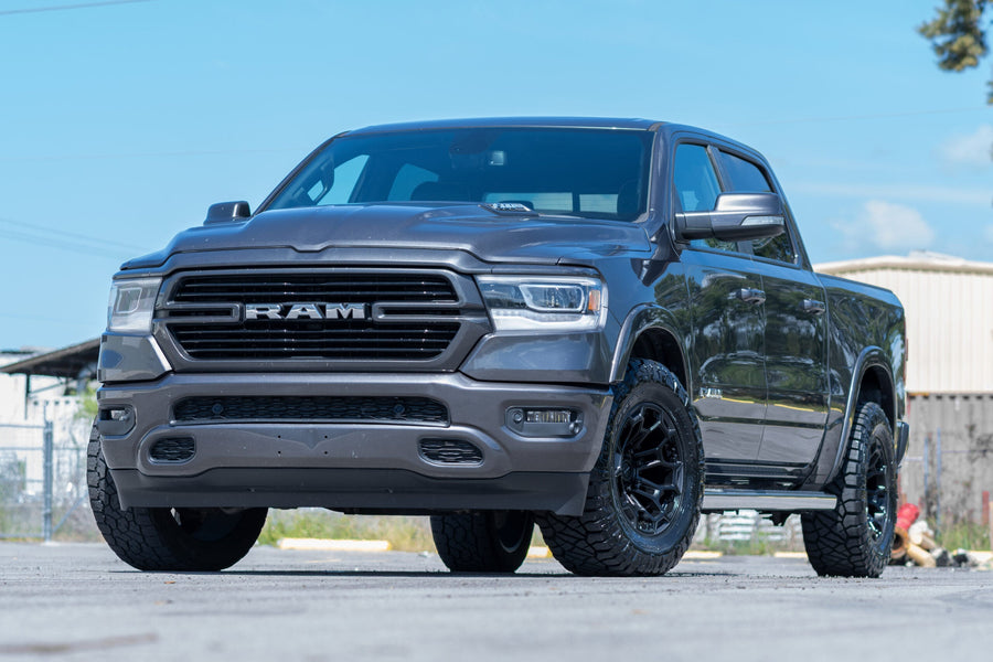RAM 1500 DF03 DEFIANT WHEELS 18X9 33X12.5X18 NITTO TIRE STOCK SUSPENSION
