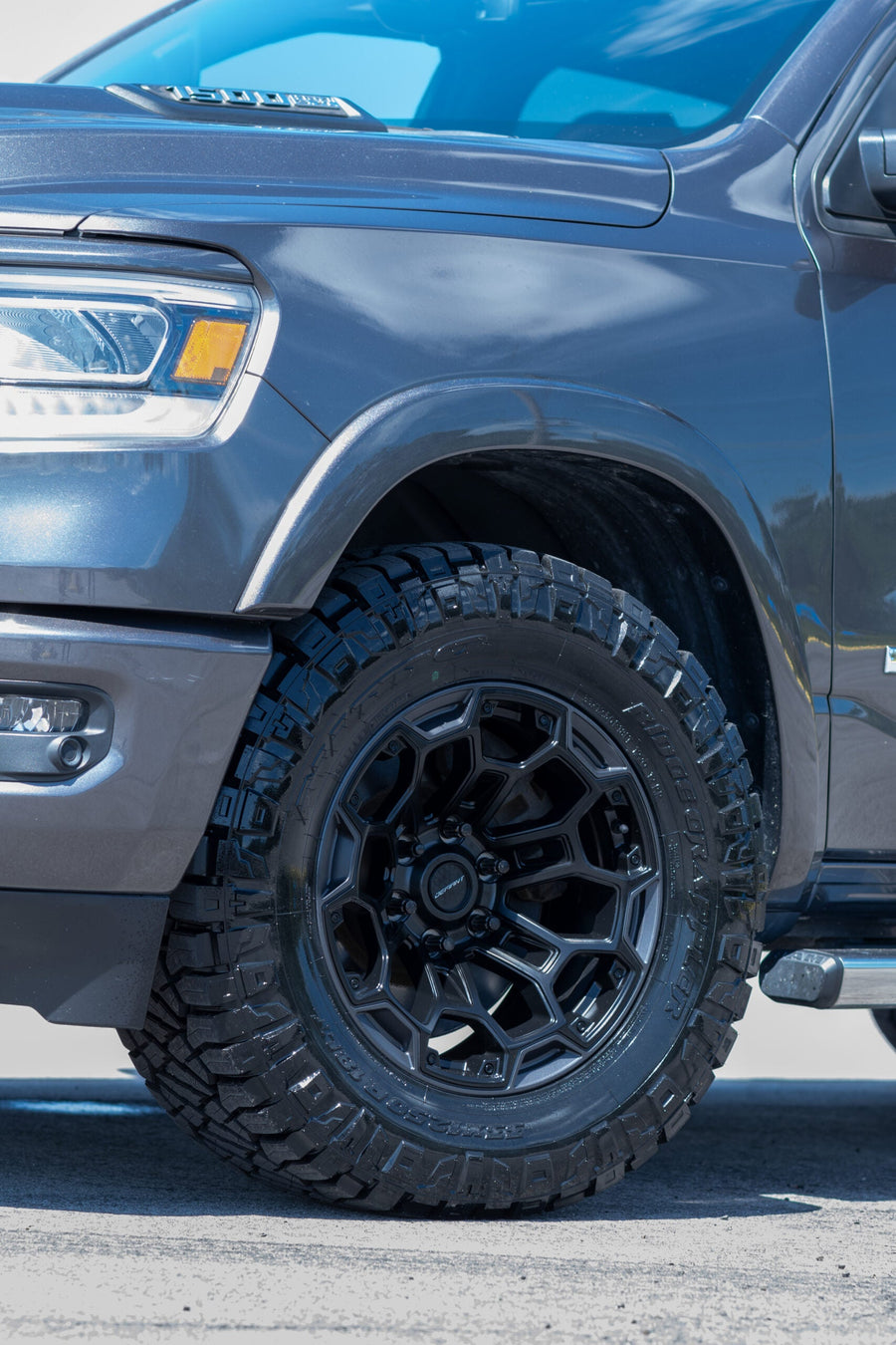RAM 1500 DF03 DEFIANT WHEELS 18X9 33X12.5X18 NITTO TIRE STOCK SUSPENSION