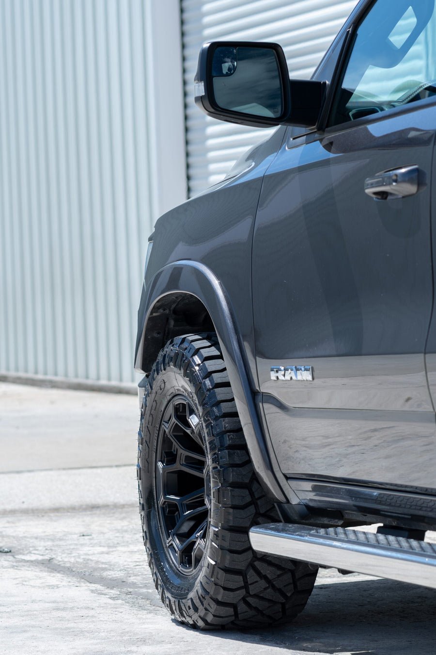 RAM 1500 DF03 DEFIANT WHEELS 18X9 33X12.5X18 NITTO TIRE STOCK SUSPENSION