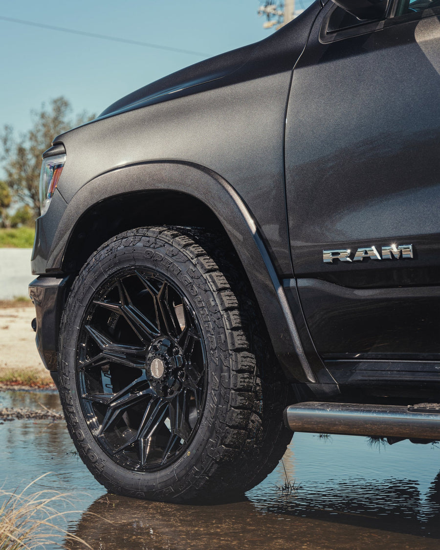 Ram 1500 4PLAY Wheels 4P83 Black 22x10 Toyo Tires 33x12.5x22 Stock Suspension