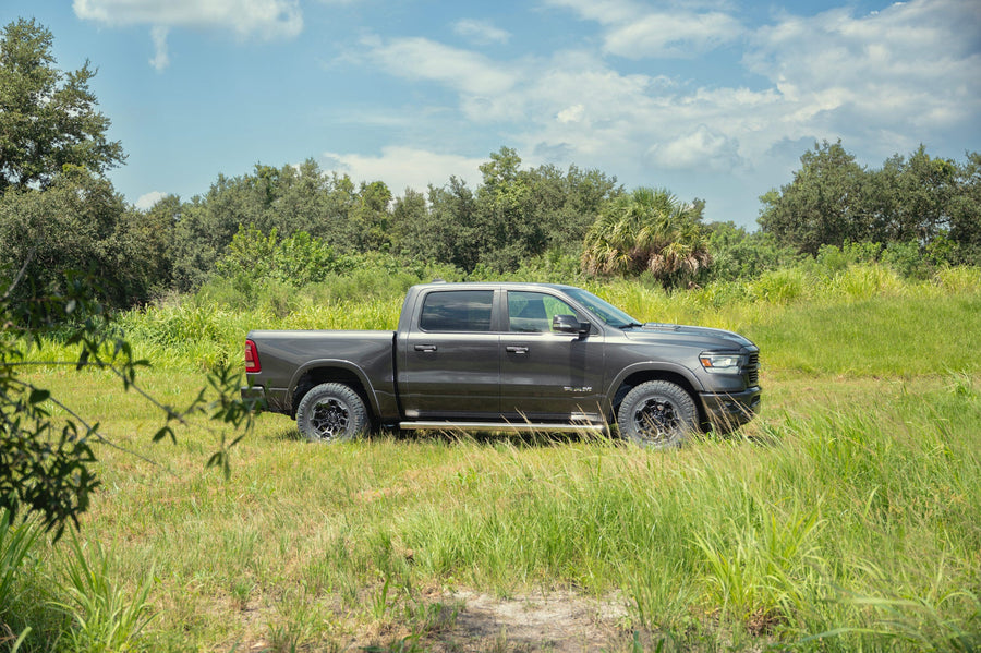 Ram 1500 DEFIANT Wheels DF03 18x9 33x12.5x18 Tire Stock Suspension