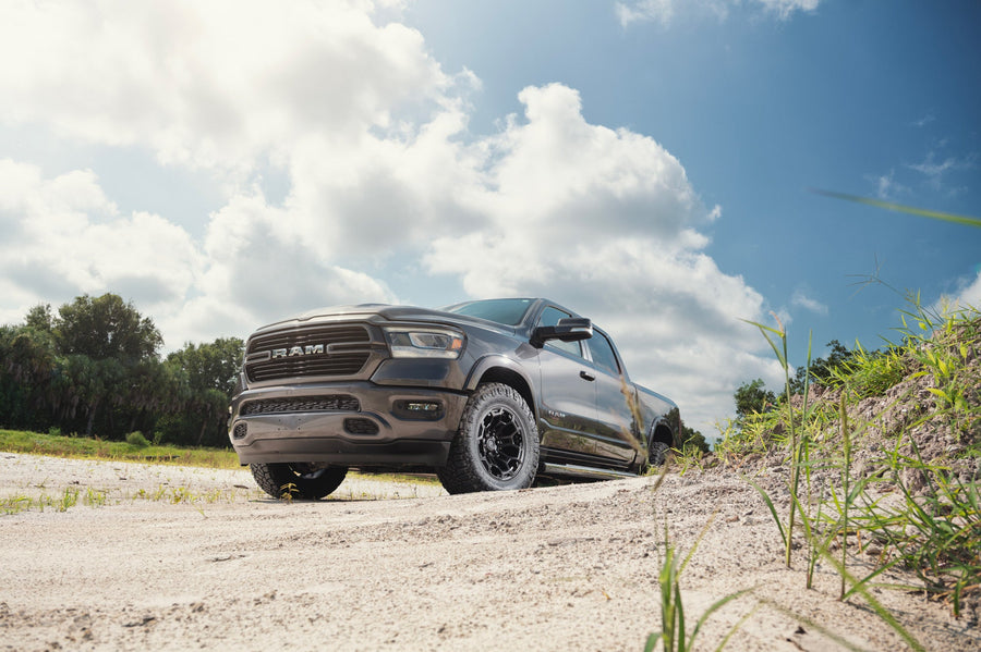 Ram 1500 DEFIANT Wheels DF03 18x9 33x12.5x18 Tire Stock Suspension
