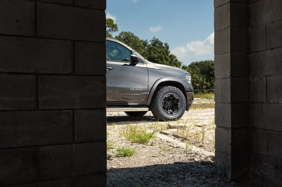 Ram 1500 DEFIANT Wheels DF03 18x9 33x12.5x18 Tire Stock Suspension