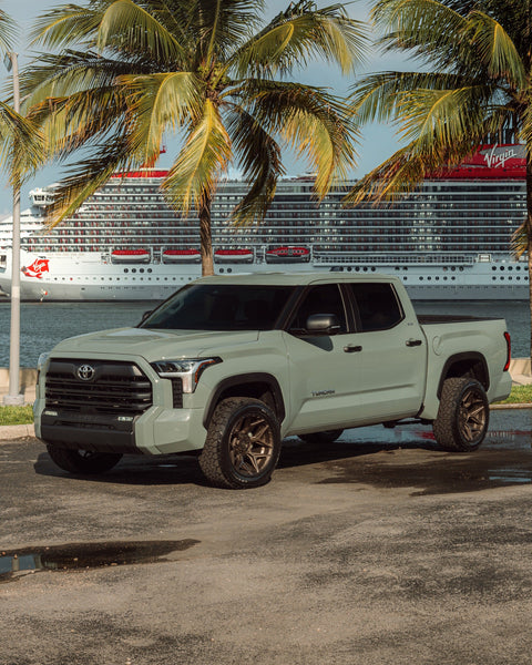 ’24 Toyota Tundra on our New 4P06 Bronze Finish with a 275-50-20 Tire on Stock Suspension